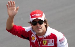 Fernando Alonso takes chequered flag on home turf
