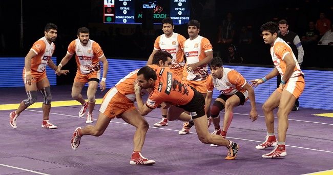 U Mumba captain Anup Kumar tries to leap for the midline while Surjeet of the Puneri Paltan tries to stop him in his tracks in match 52 of the Star Sports Pro Kabaddi season 3 in Mumbai