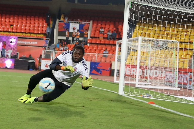 FC Pune City goalkeeper Apoula Edima Edel Bete warm up before the match 21 of the Indian Super League (ISL) season 3 between FC Pune City and Chennaiyin FC held at the Balewadi Stadium in Pune, India on the 23rd October 2016.