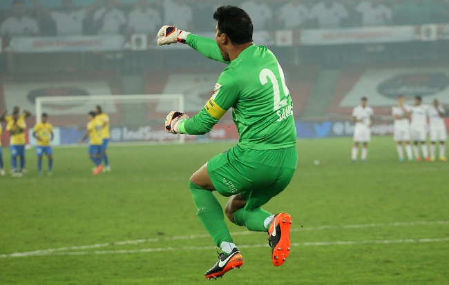 Kerala Blasters FC goalkeeper Sandip Nandy celebrates saving a penalty during the Semi-final 2nd Leg match