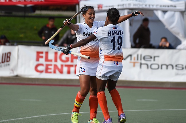 India skipper Rani celebrates with Namita Toppo after winning the Women’s Hockey World League Round 2 final against Chile in West Vancouver on April 9, 2017. 