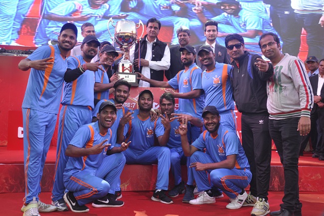 Shri Shyam Cricket Club from Jaipur poses with the winning Wonder Cement Saath7 Cricket Mahotsav trophy