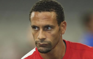 Ferdinand fined for racist tweet