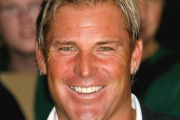 Shane Warne banned and fined for on-field outburst
