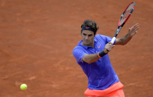 Federer knocked out of French Open 2015